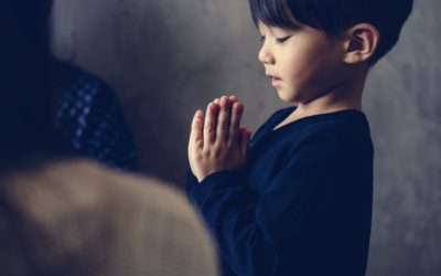 Japanese boy praying