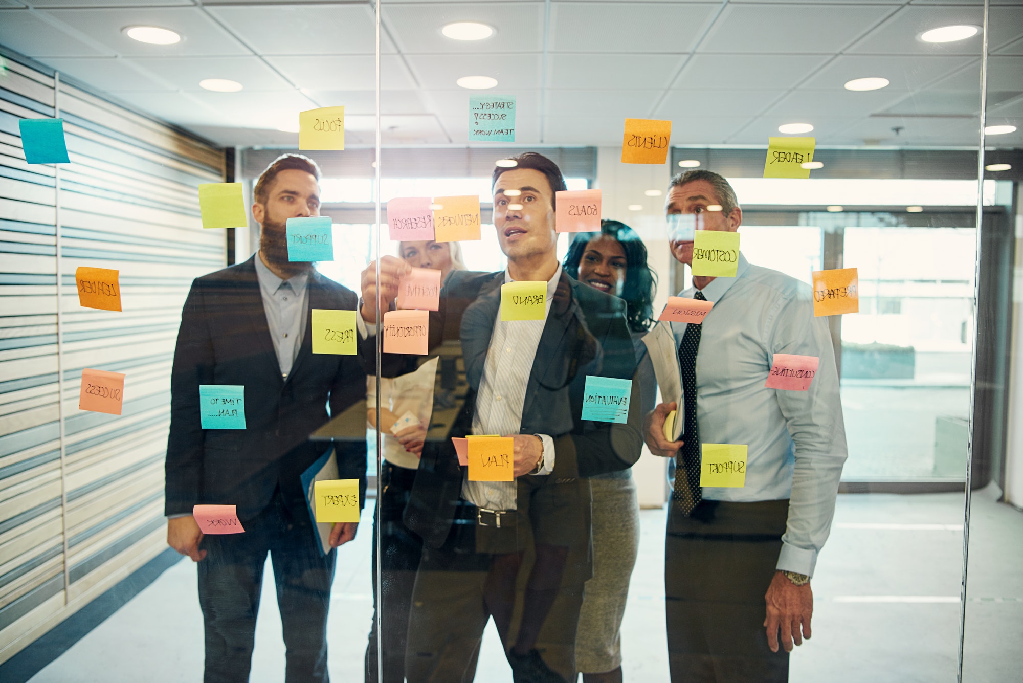 The team in office communicating and planning