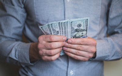 Businessman holding money in his hands