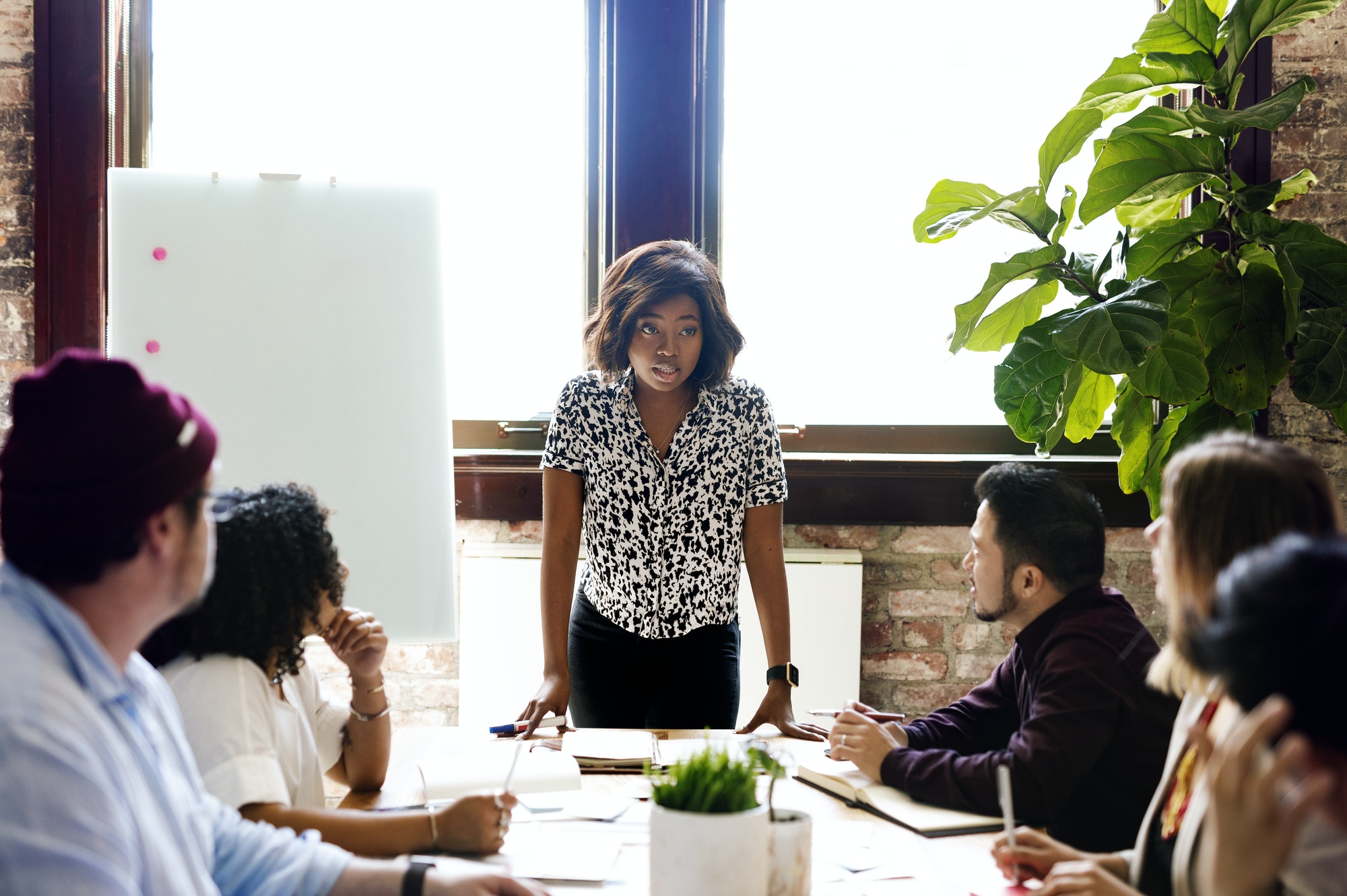 Black businesswoman taking the lead in the meeting room