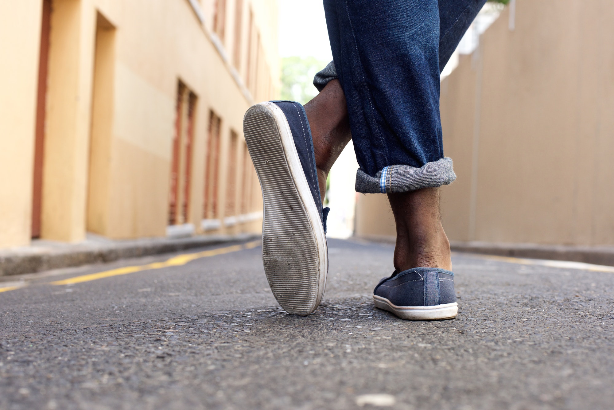 Ground level man standing on street