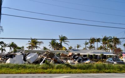 Piles of damaged property along the side of the highway after hurricane Irma.