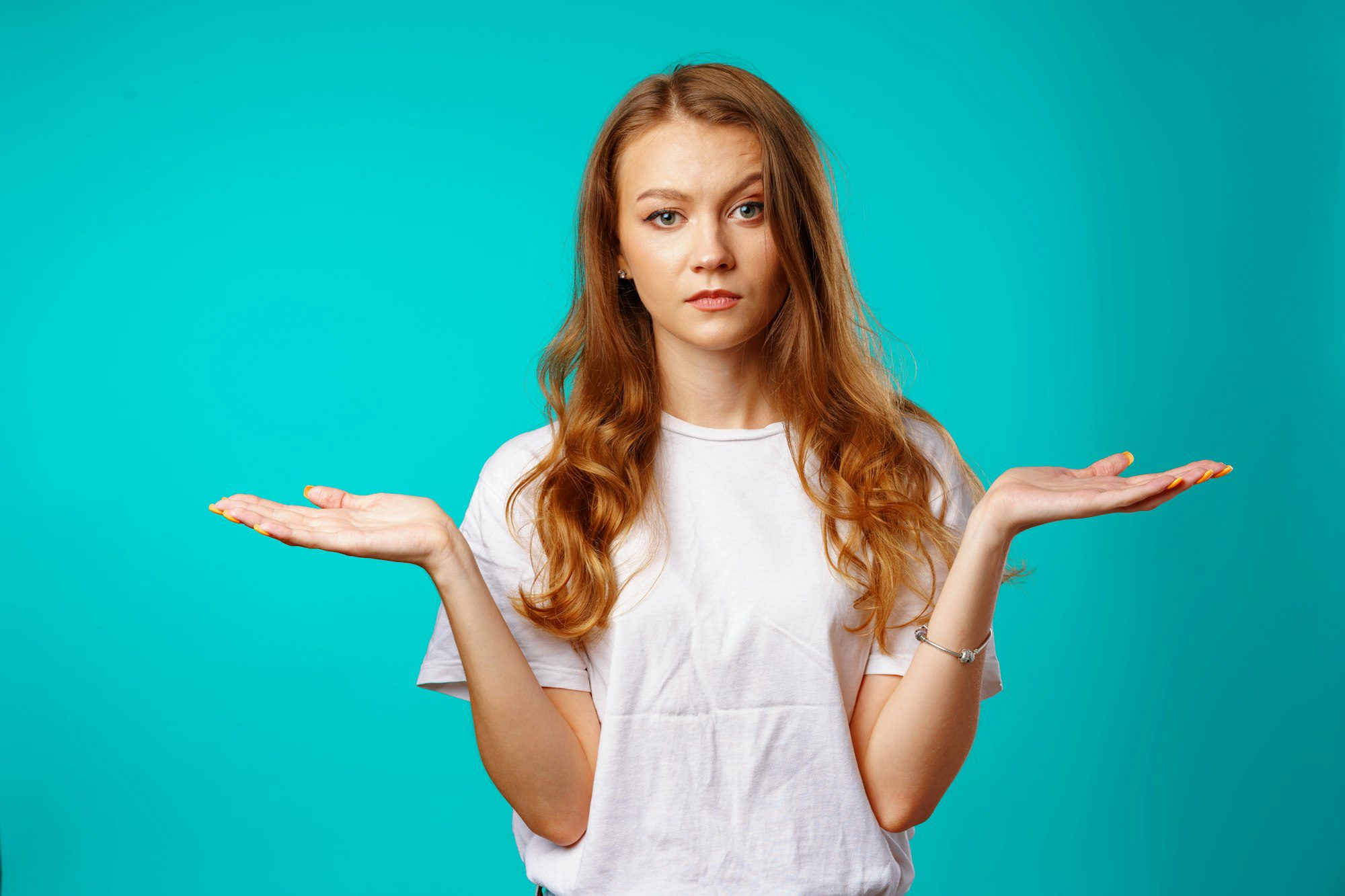 Young caucasian girl making do not know sign