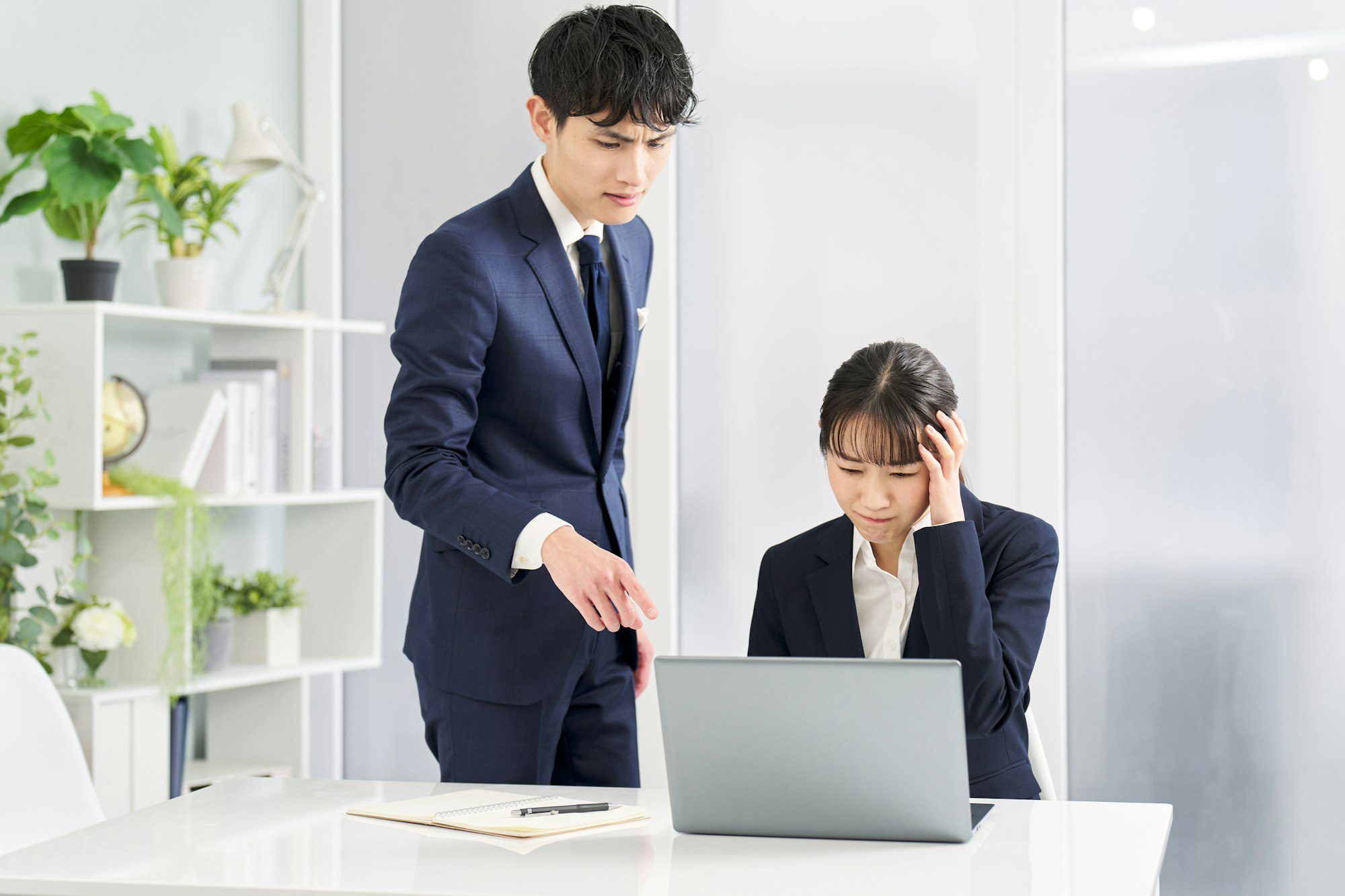 Business woman being blamed for problems at work Business woman being blamed for problems at work
