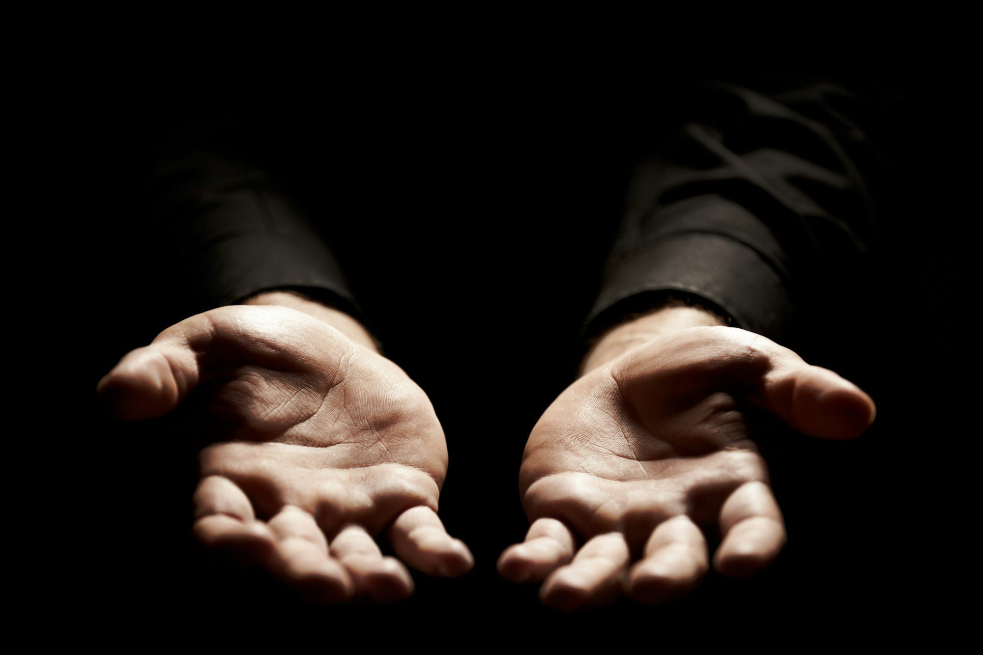 Open to God. Hands stretched out in acceptance of God.