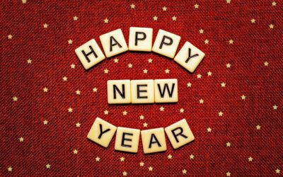 happy new year spelled with scrabbles on a red background