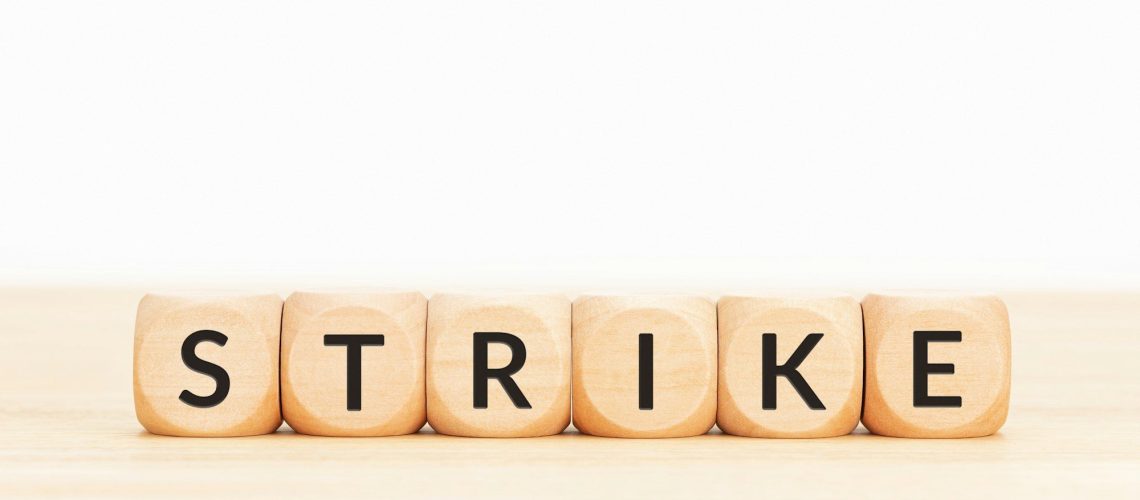 Strike word on wooden blocks
