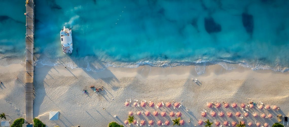 The activity of Grace Bay Turks and Caicos at sunset, as the tour boat delivers its passengers home