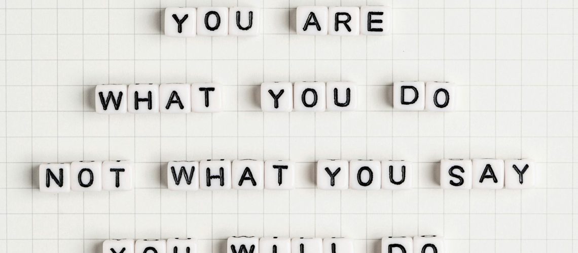 YOU ARE WHAT YOU DO NOT WHAT YOU SAY YOU WILL DO beads message typography