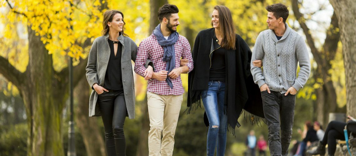 Young people in the autumn park